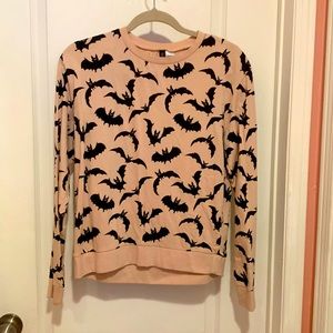 Pink and black bats pull over crew neck, long sleeve sweater